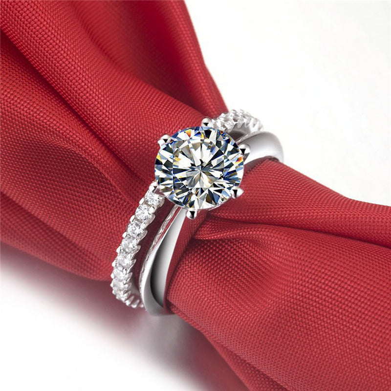925 Sterlingsilber, vergoldeter Sechs-Krappen-Ring mit Moissanit & T-Carbon-Diamant